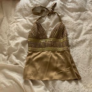 Till the end gold halter top size small.  This ties at the neck